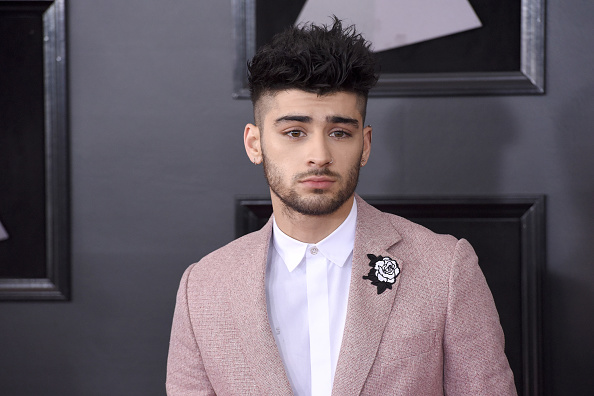 Zayn Malik rocks a stellar blush suit at the 60th Grammy Awards. 