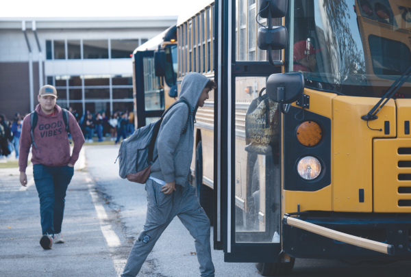 Students load onto the buses behind the Commons after school on Oct. 26. 