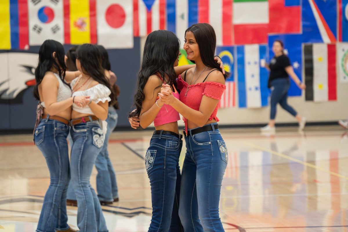 Latin Students show culture through dance at the student multicultural assembly On April 12.