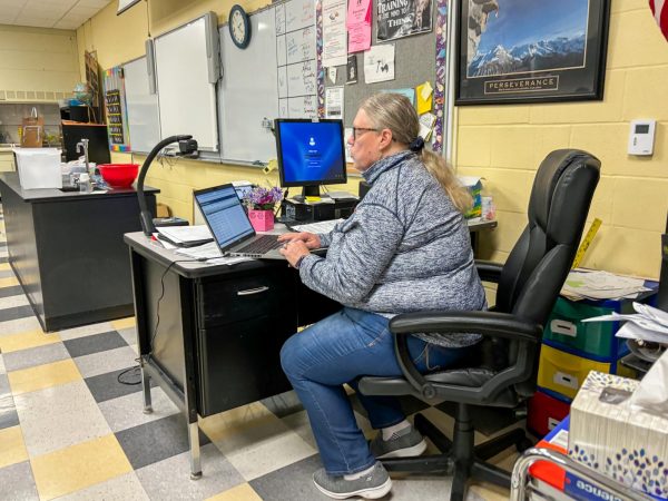 Phycisal Science teacher Sharon Fanning works hard to ensure proper attendance her class on April 22. Keeping up-to-date records is one of the many job requirements for teachers.