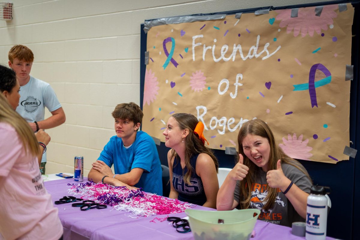 Students visit the Friends of Rogers table at the Club Fair on Aug. 30.