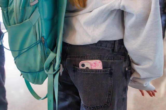 Students hide the newly banned device somewhere easily acceptable but far enough from reach to avoid temptations.