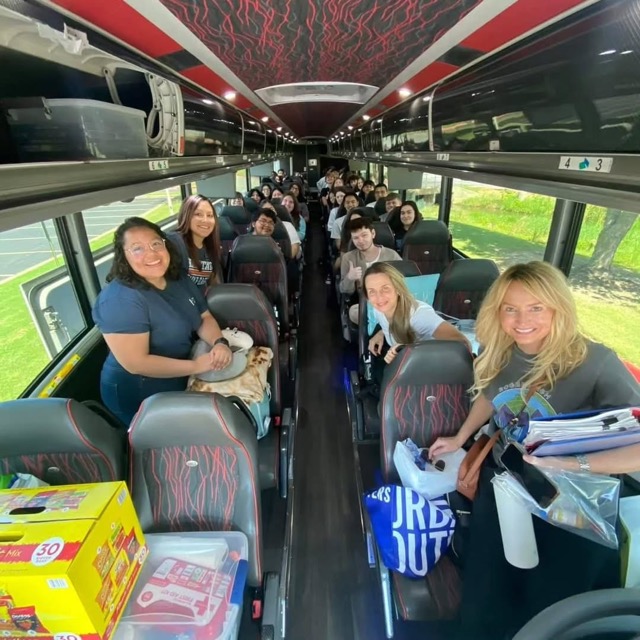 Bus full of students gathered for RHA trip to Ohio and Indiana in 2023.