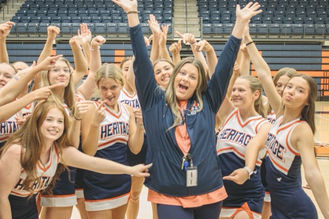 Game day Cheer team adores their new beloved Coach, Hailey Mason.